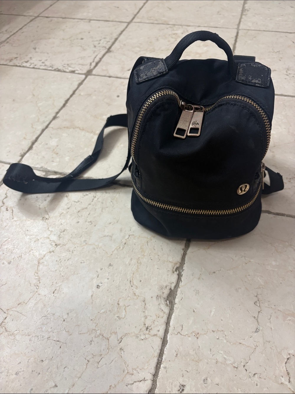 lululemon athletica Black Mini Backpack with Gold Zippers (used-wear and tear)